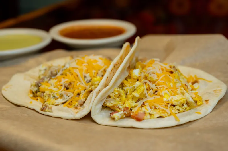 Breakfast tacos with eggs, cheese, and bacon at Lupita's
