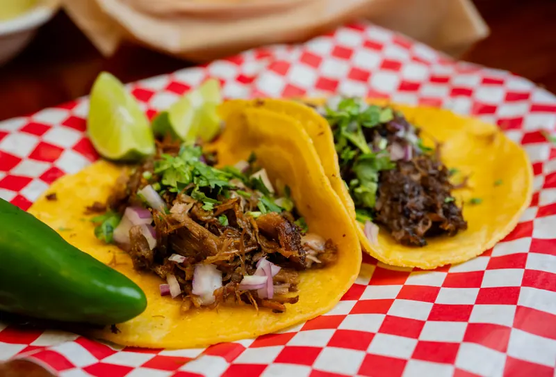 Tacos with onion, cilantro and lime