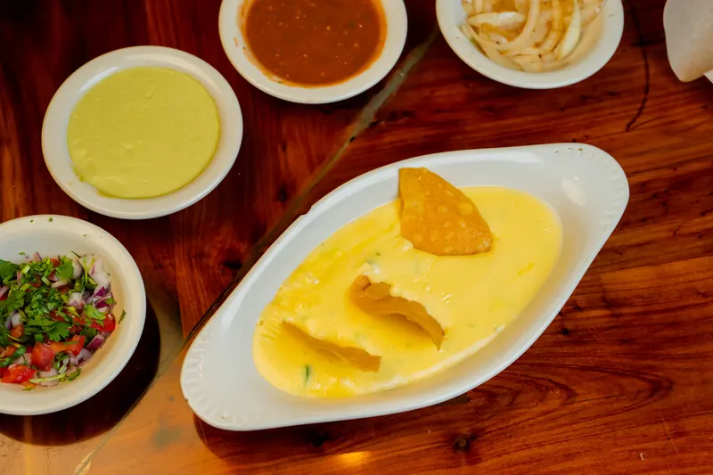 Queso dip with tortilla chips